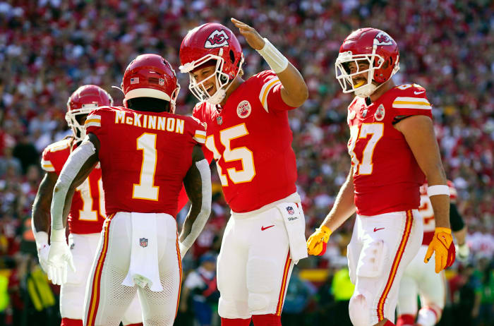 Sep 24, 2023; Kansas City, Missouri, USA; Kansas City Chiefs running back Jerick McKinnon (1) celebrates with quarterback Patrick Mahomes (15) and tight end Travis Kelce (87) after scoring a touchdown against the Chicago Bears during the first half at GEHA Field at Arrowhead Stadium. Mandatory Credit: Jay Biggerstaff-USA TODAY Sports
